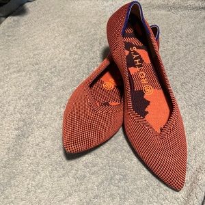 Rothy’s size 8.5w orange and black with a touch of blue